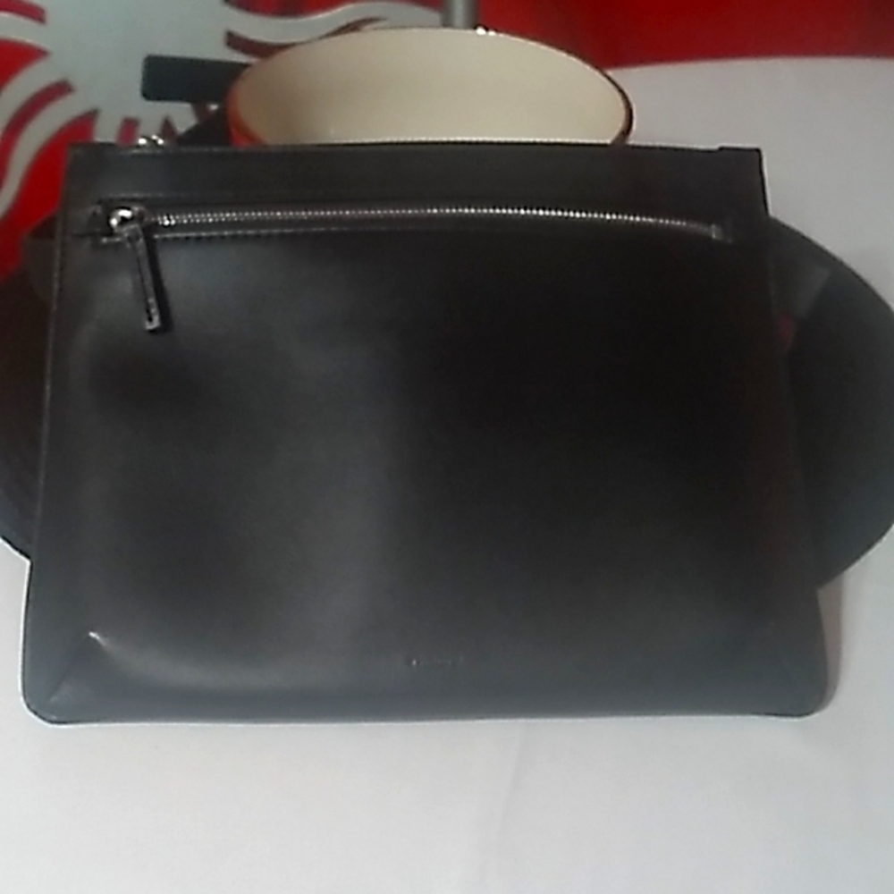 Pocketbook for the hip black silver zippers made by Theary 7in by 9in
